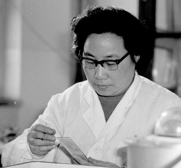 Tu Youyou conducting research in a laboratory