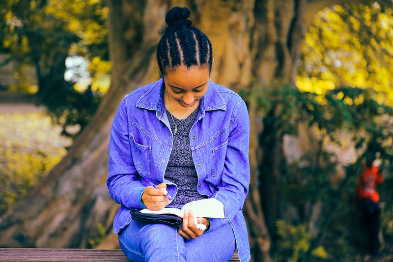 Writer at work, exploring their unique voice