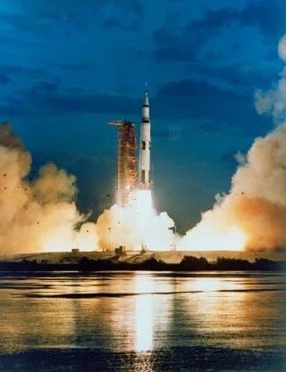 Saturn V rocket launching into space