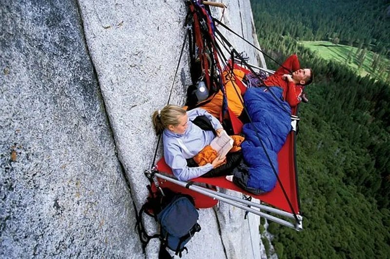 Rock climbers sleeping on cliffs