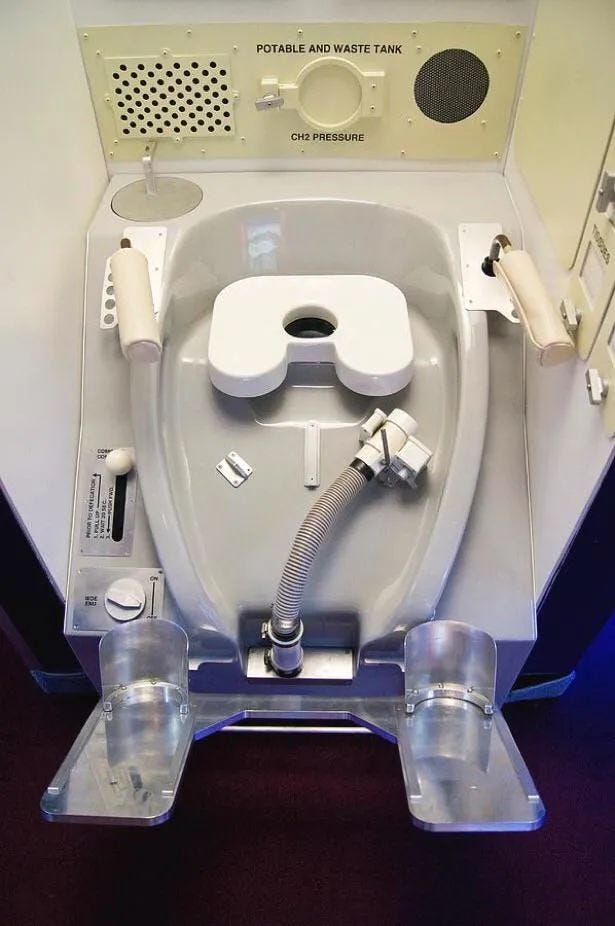 Space shuttle toilet system