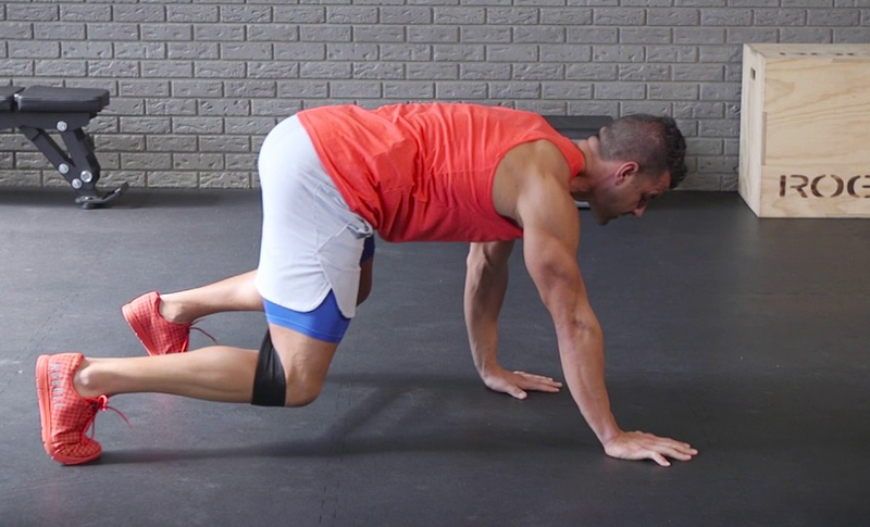 Banded Bear Plank Crawl Exercise